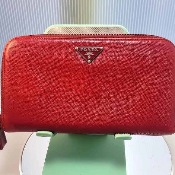 Prada Handbags - AUTHENTIC PRADA RED LEATHER ZIP LONG WALLET GOOD USED CONDITION